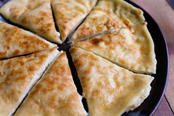 Culinary & Wine tour in Kakheti region - Shumi Winery in Tsinandali: homemade wine, bread, khinkali, and that grape tree