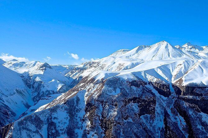 Kazbegi, Gergeti and Ananuri Full Day Tour from Tbilisi - Gudauri on the way: expect mountain vibes, not a ski day