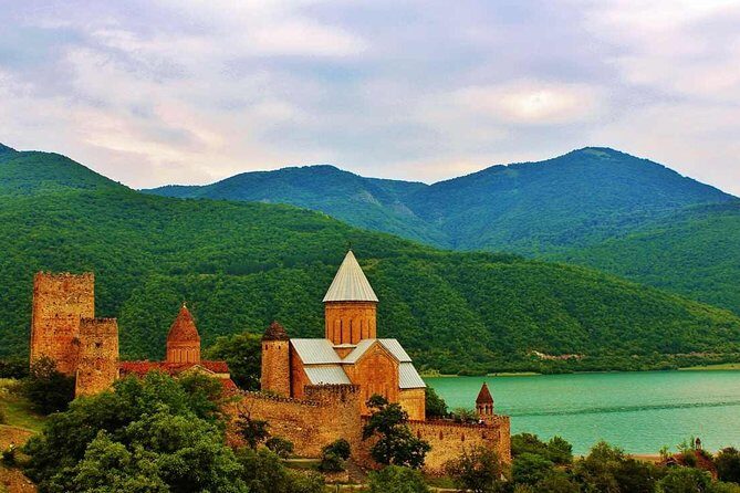 Kazbegi, Gergeti and Ananuri Full Day Tour from Tbilisi - Zhinvali Dam: quick stop, V-shaped reservoir, and turbine trivia