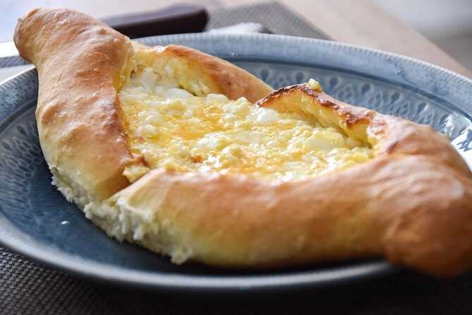 Private Cooking Class with a Tbilisi Food and City Expert Dinara - Your hands-on Georgian menu: khachapuri, khinkali or Shkmeruli, plus pkhali
