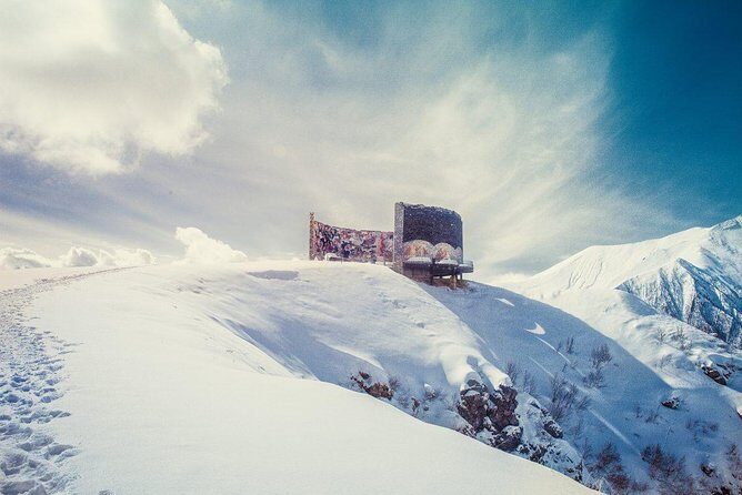 Private Full Day Tour In Kazbegi - Gudauri (Paragliding & Rafting) - Friendship Monument on the Georgian Military Highway: Gudauri views plus paragliding access