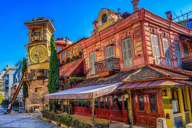 Tbilisi Walking Tour Including Cable Car and Traditional Bakery - Rezo Gabriadze’s clock tower: angels, puppets, and hourly theatre